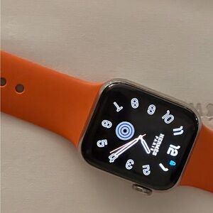 Hermes Orange Smartwatch Sleek Design Vibrant Band